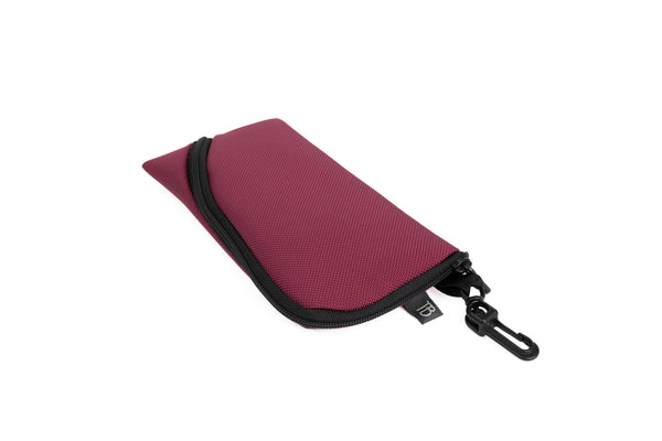 A Small Ghost Whale Pouch in Raspberry.